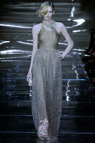 gold sequin sleeveless gown