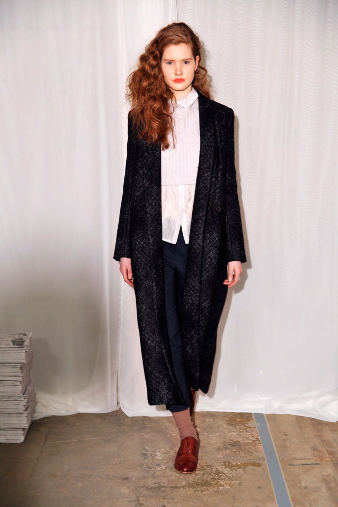 black wool coat with blouse and pants