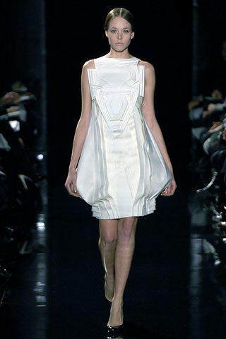 white pleated sleeveless dress