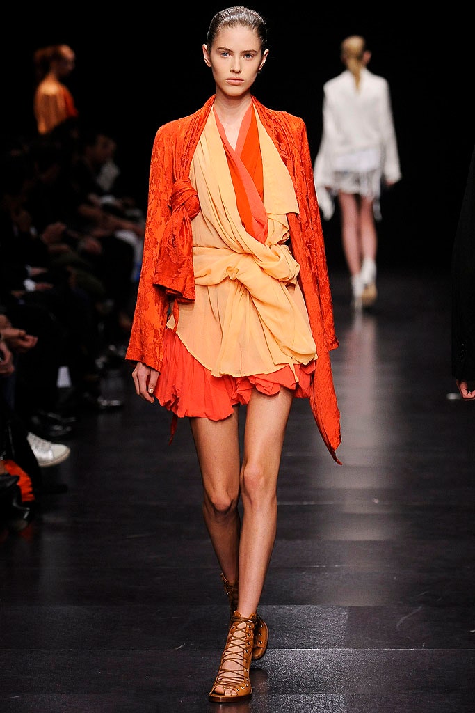 orange layered mini dress with cape