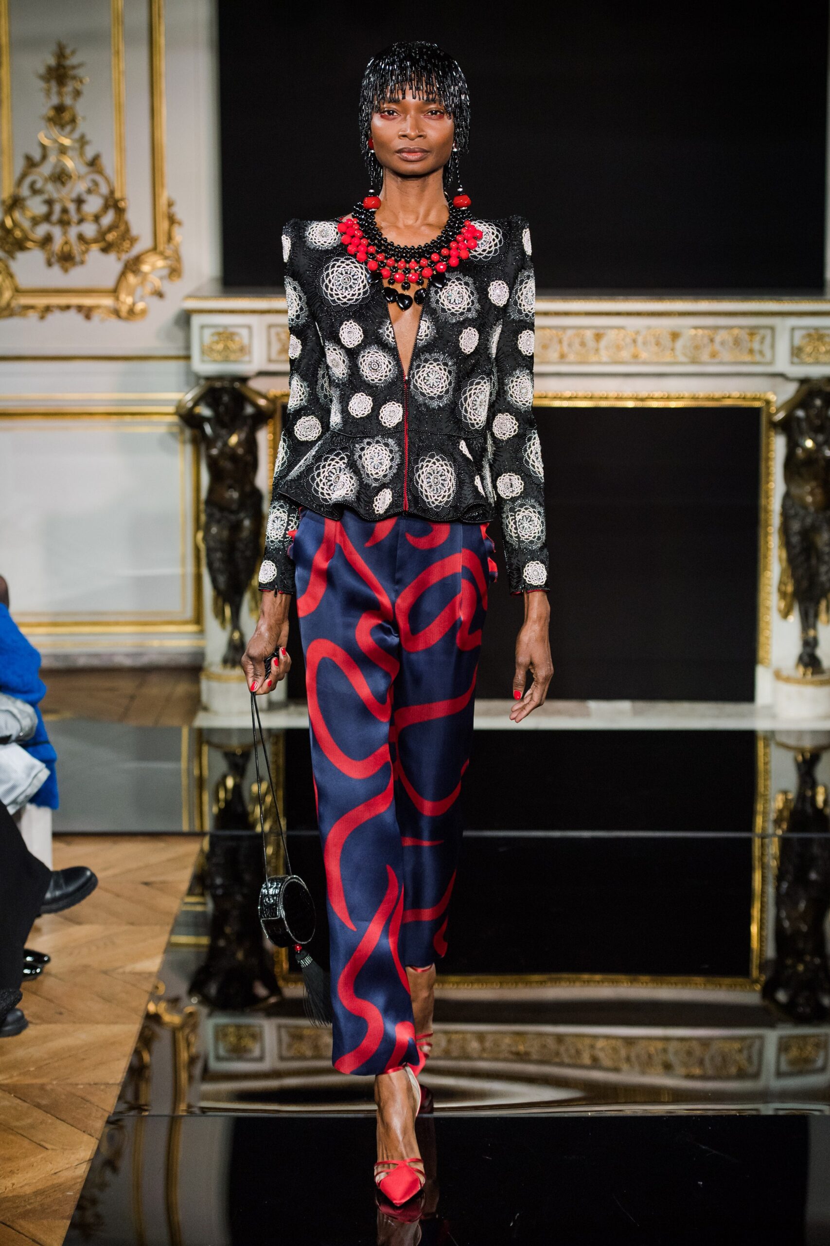 black and white embroidered blazer with printed pants