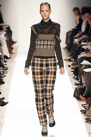 black fitted top with checked pants