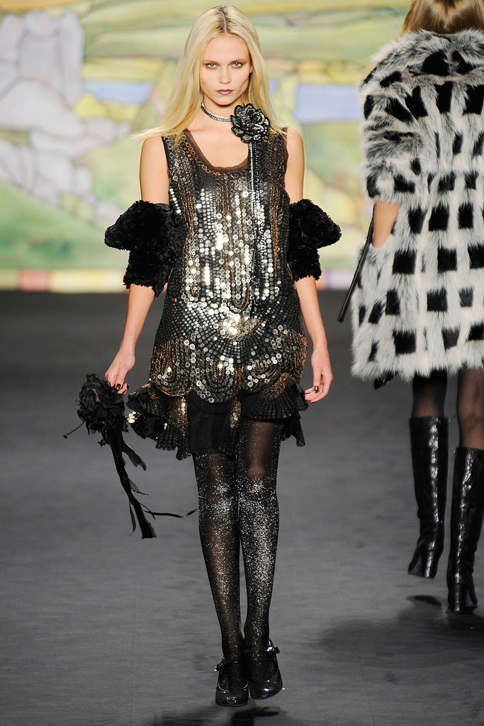 black sequined mini dress with fur cape