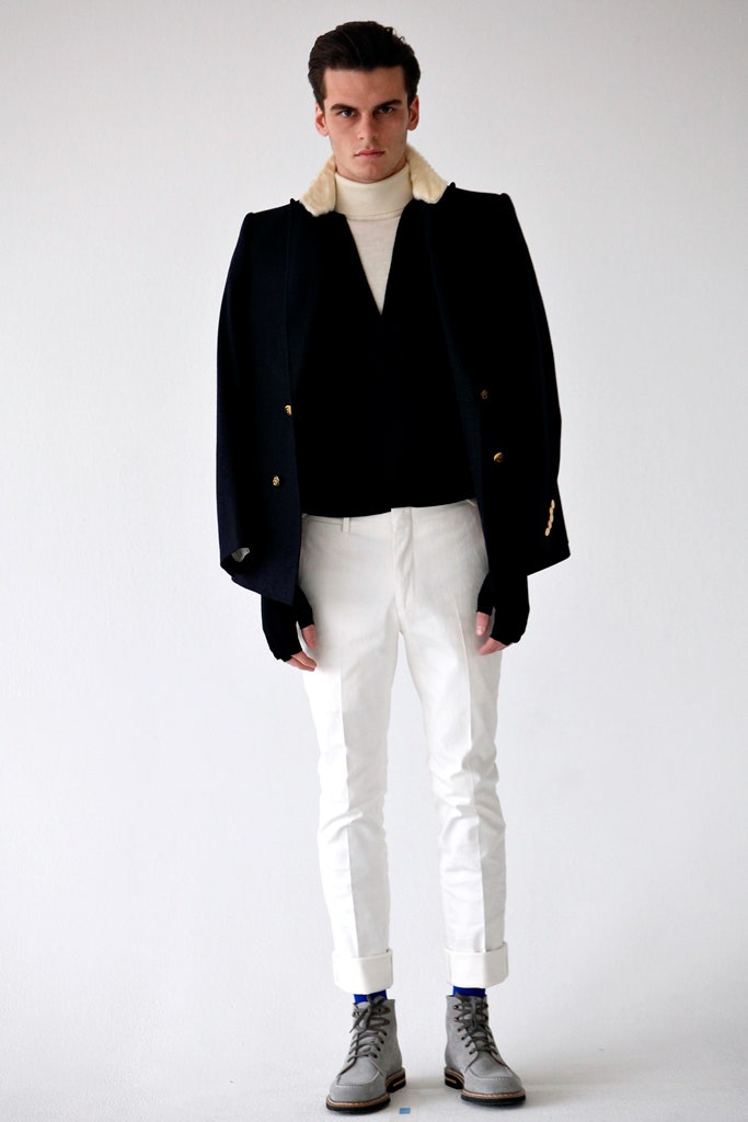 black wool cape with fitted sweater