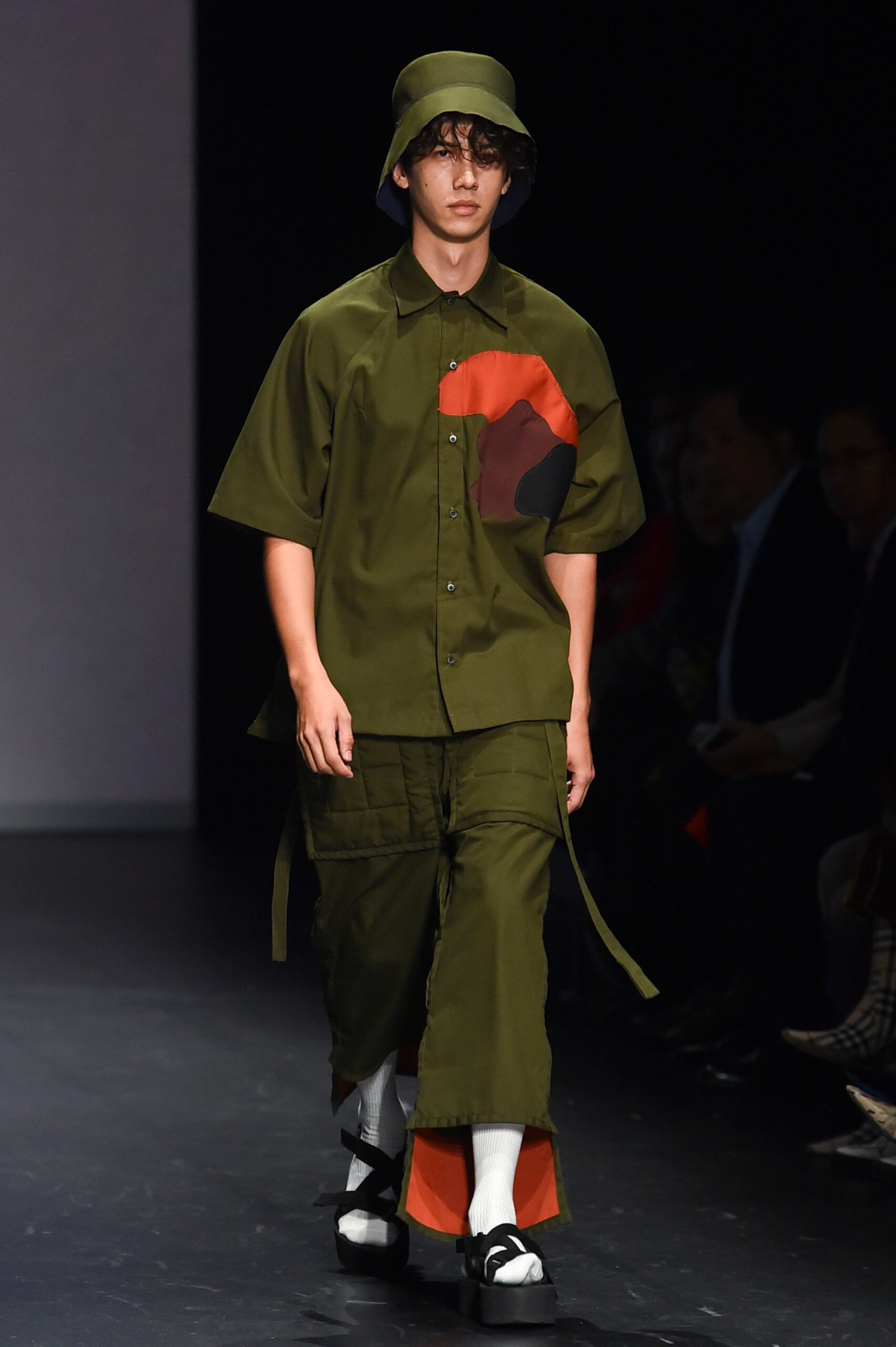 green color-blocked shirt and pants