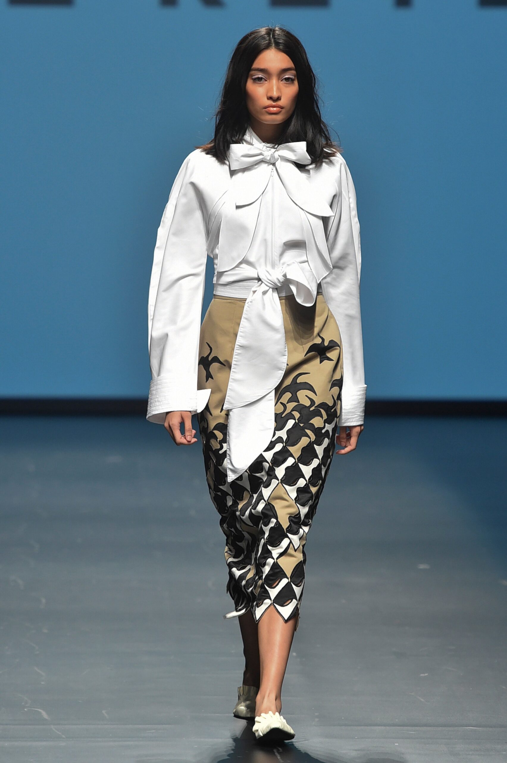 white fitted blouse and midi skirt