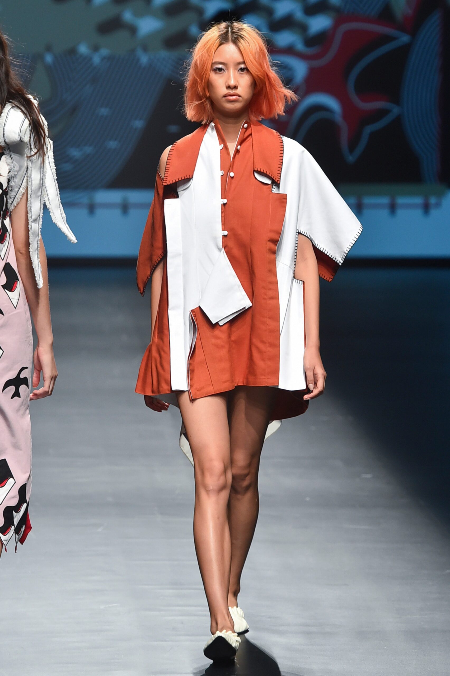 orange and white relaxed poncho