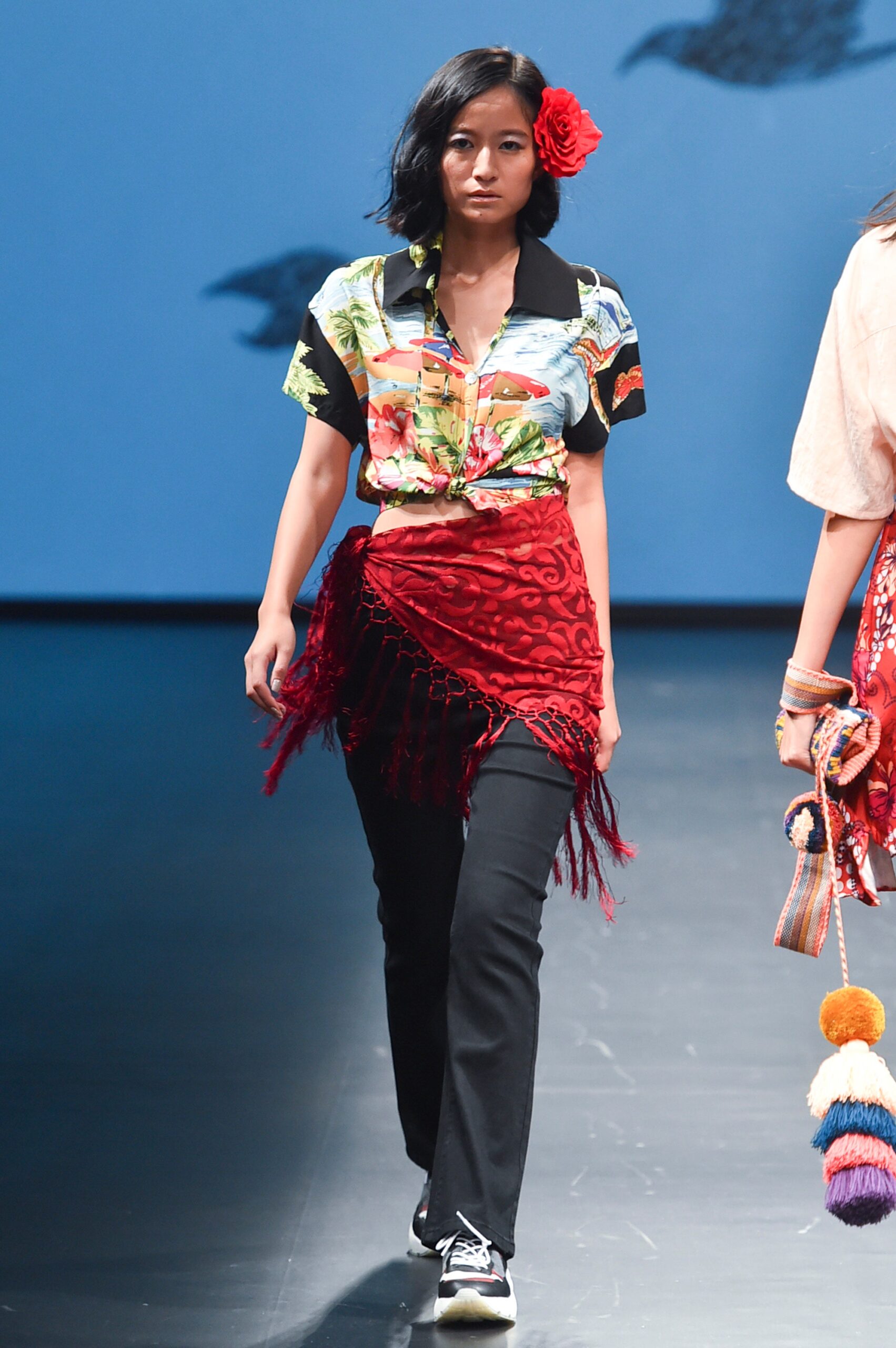 multi-colored shirt with red skirt