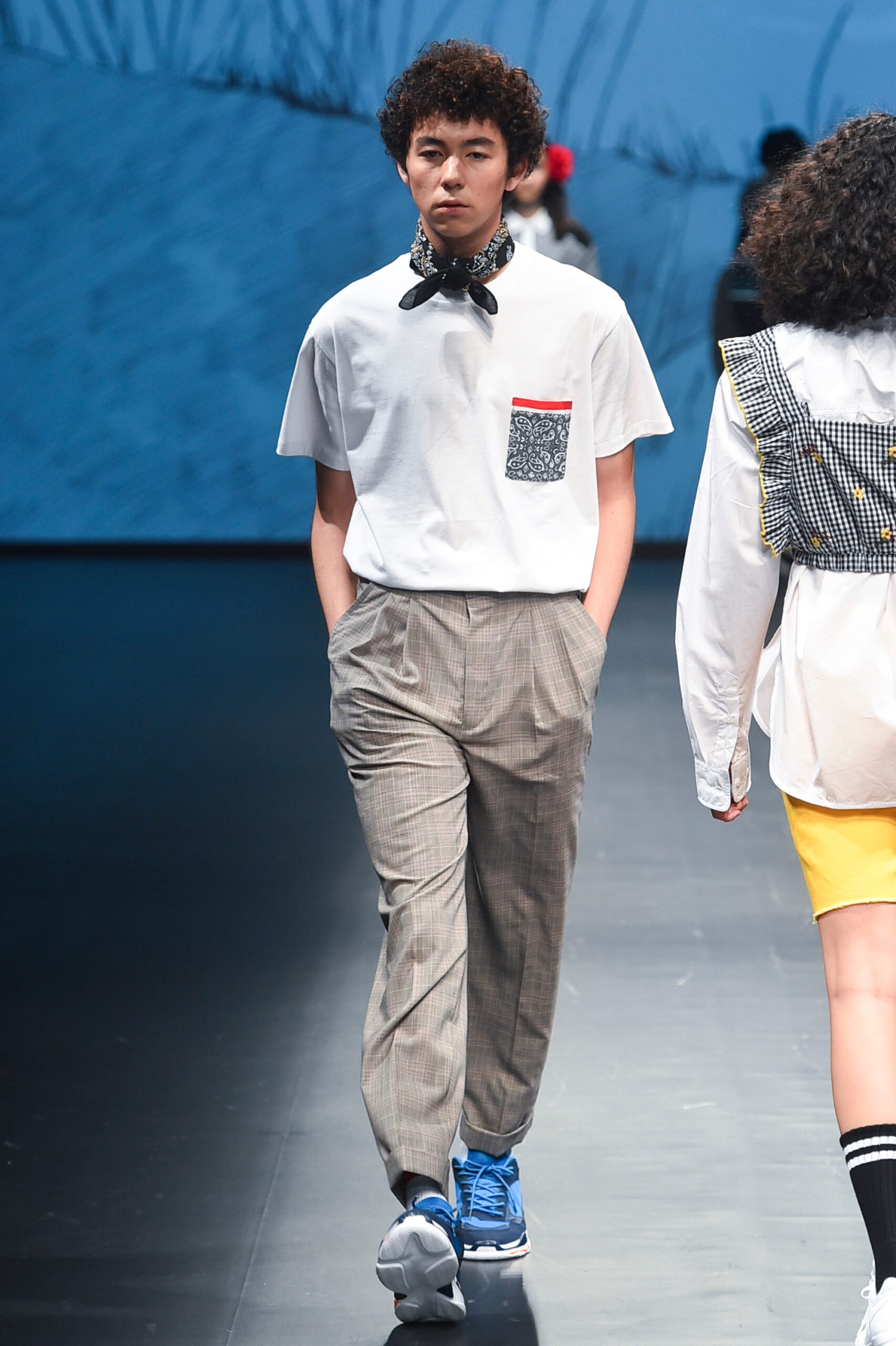 white t-shirt gray pants blue shoes