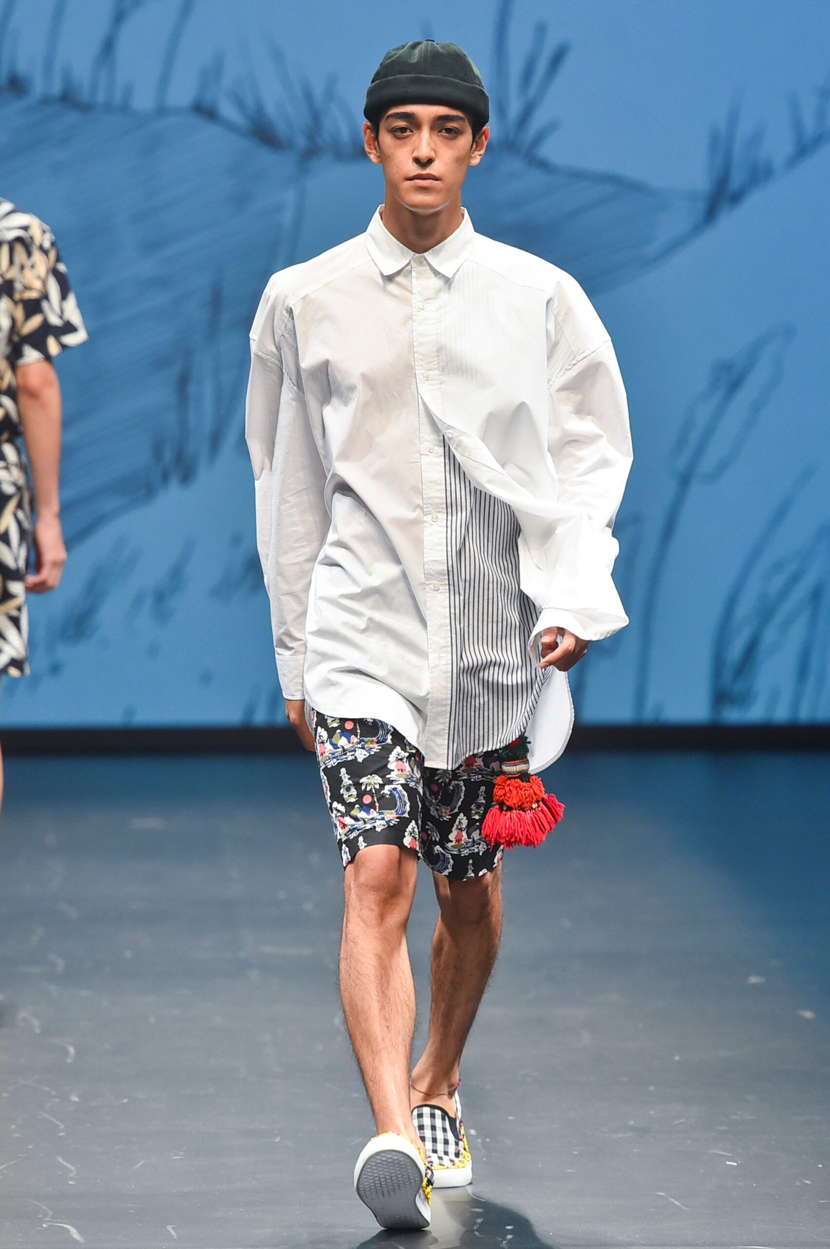 white relaxed shirt with printed shorts