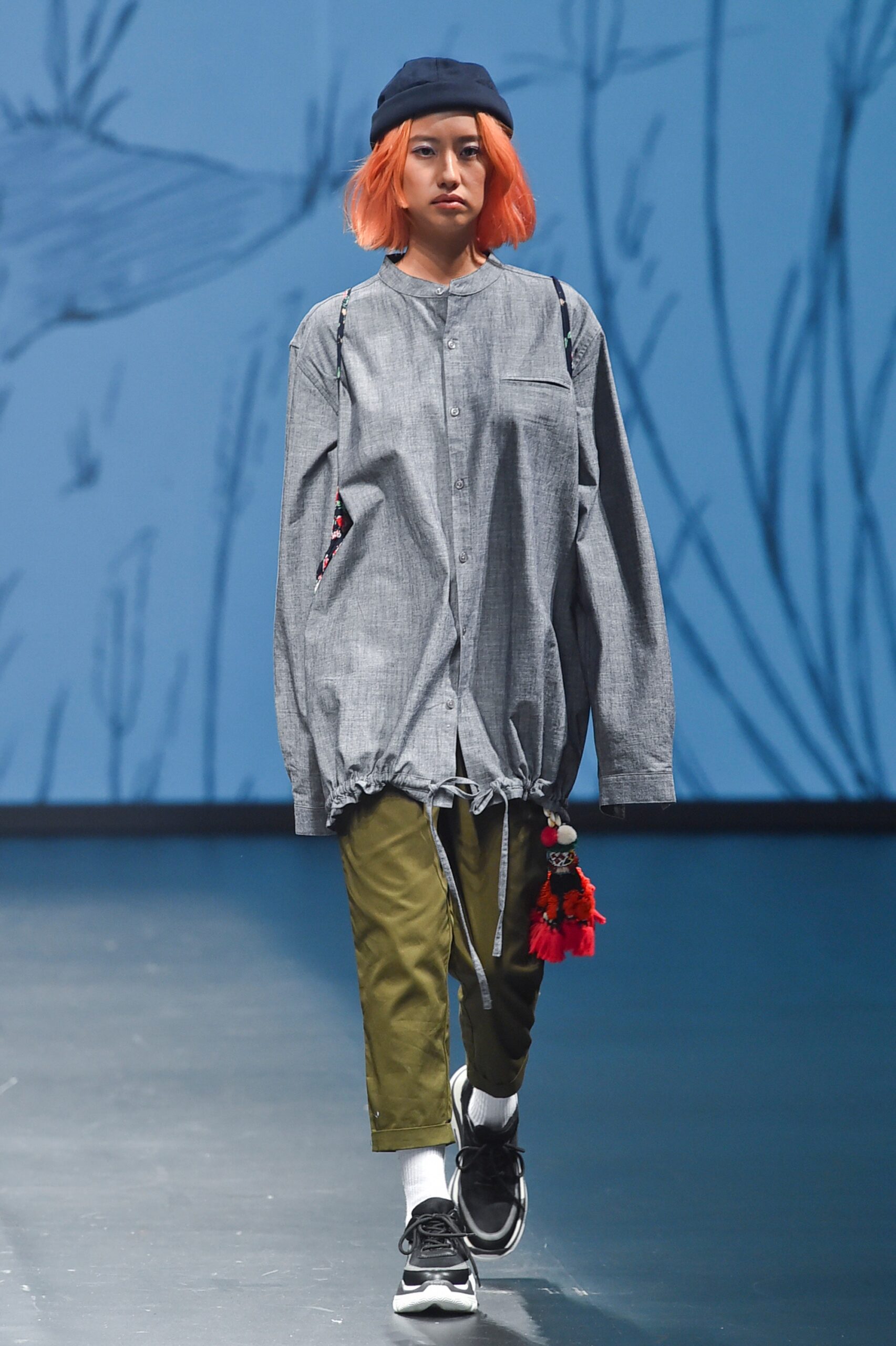 gray relaxed shirt with green pants