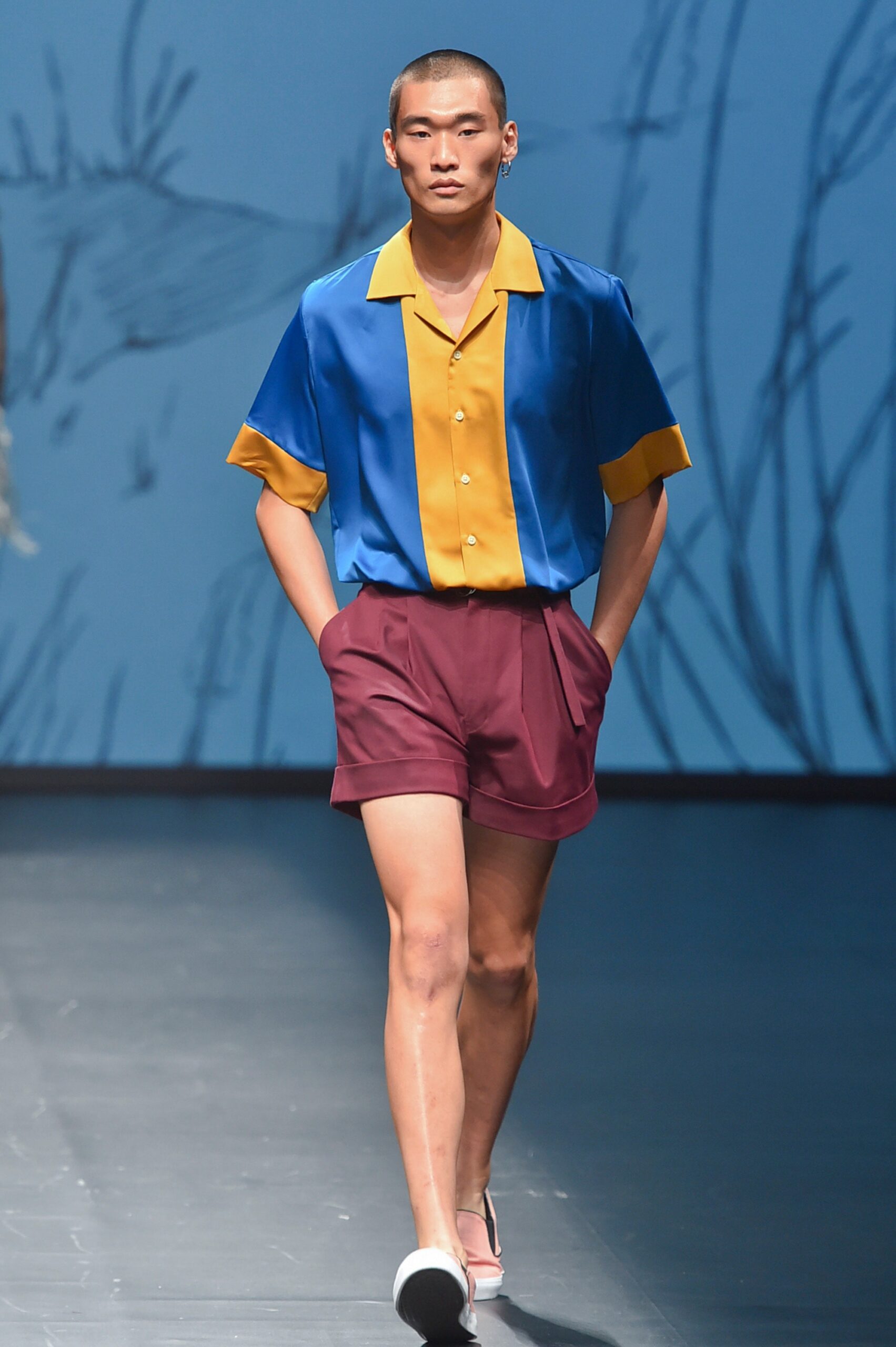 color-blocked shirt and maroon shorts