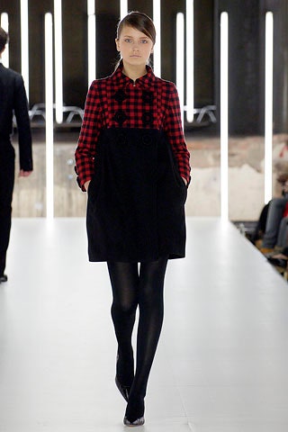 black wool relaxed coat and red checked shirt