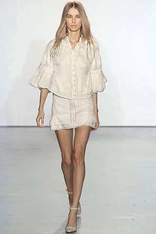 white cotton long-sleeve collared relaxed ruffled blouse