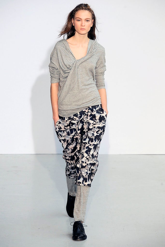 gray draped top with printed pants