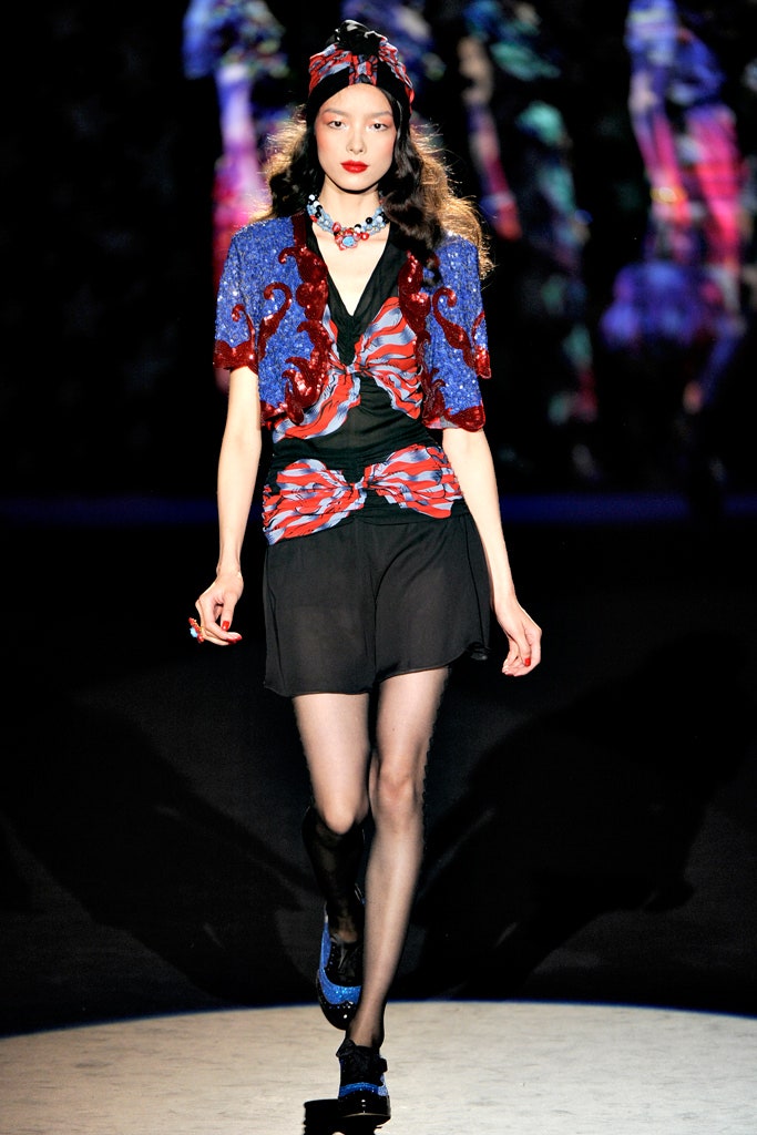 blue red ruffled top with black mini skirt