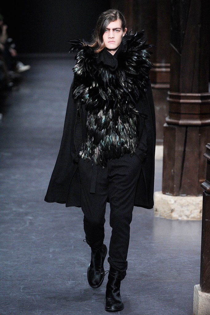 black fur cape with fitted pants