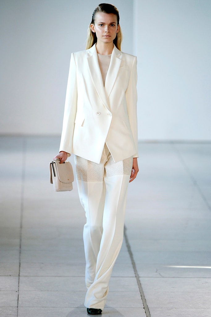 white tailored suit with bag