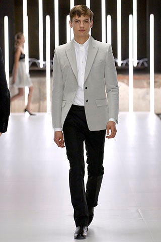 gray tailored blazer with black pants
