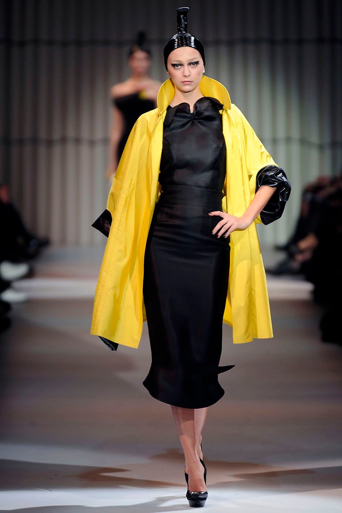 black silk fitted dress with yellow coat