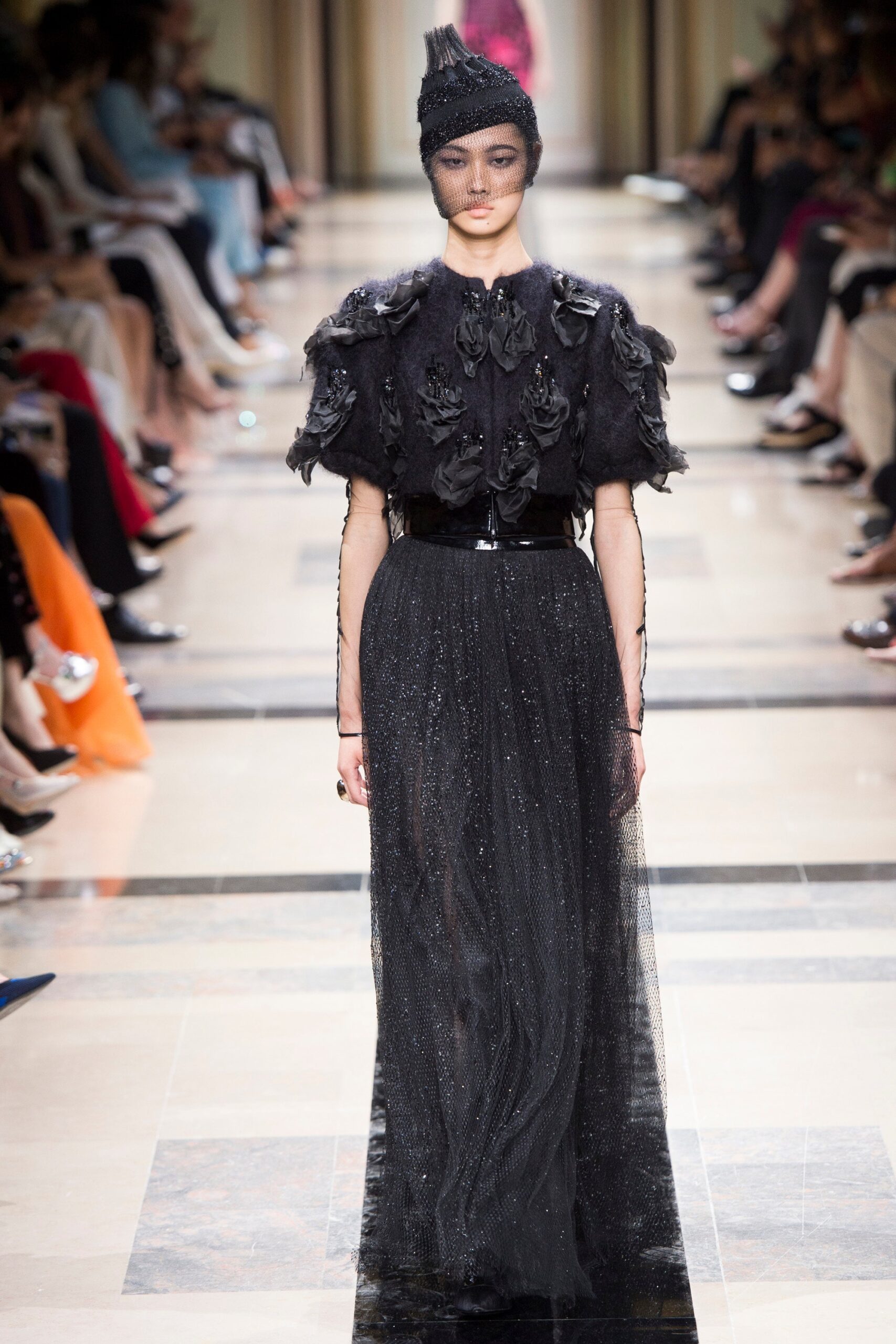 black ruffled gown with belt