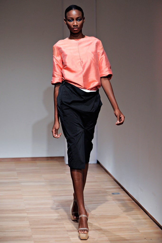 pink silk relaxed top with black pencil skirt