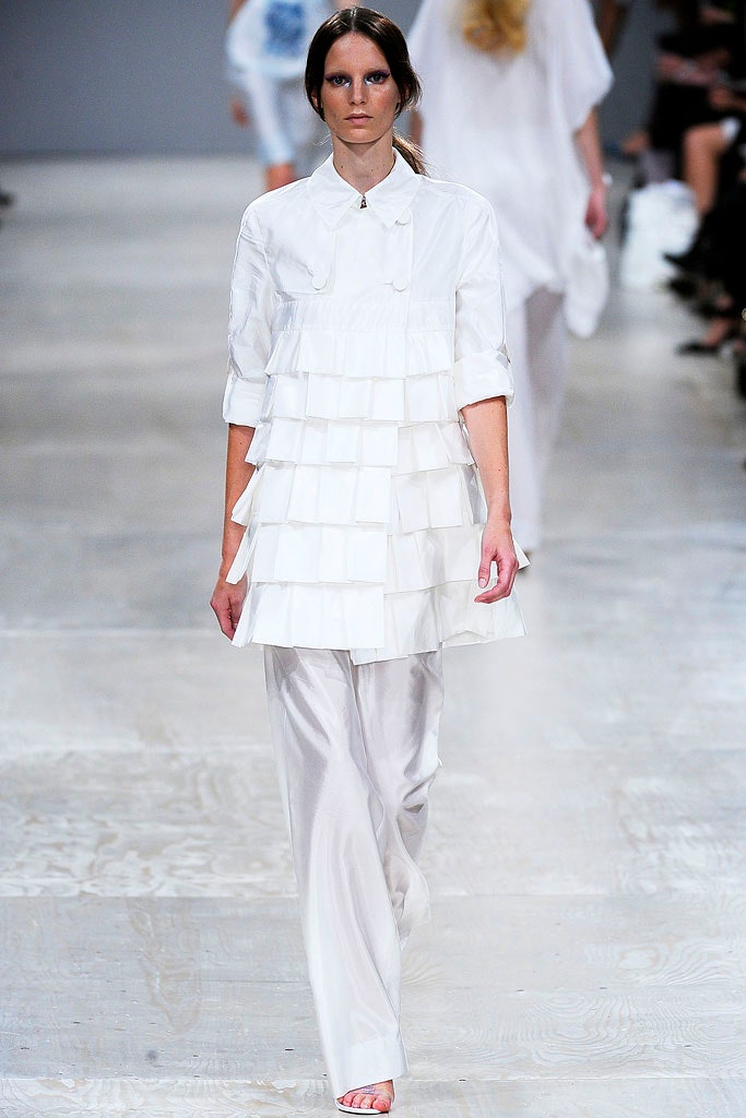 white pleated top with relaxed pants