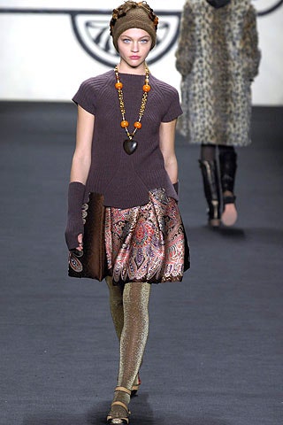 purple knit top with flared skirt