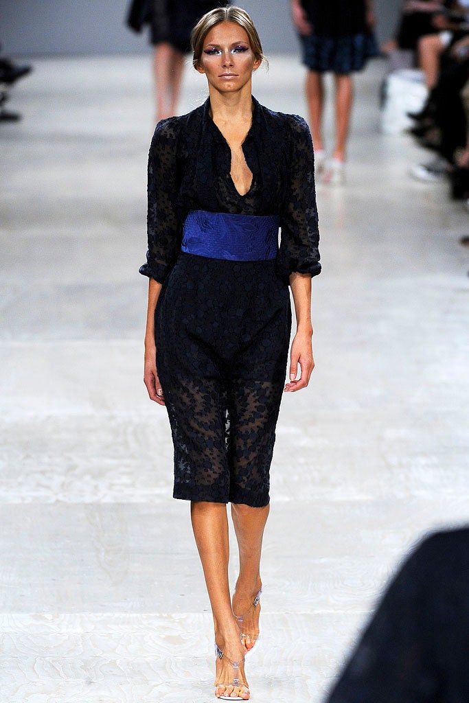 black lace fitted jumpsuit with blue belt