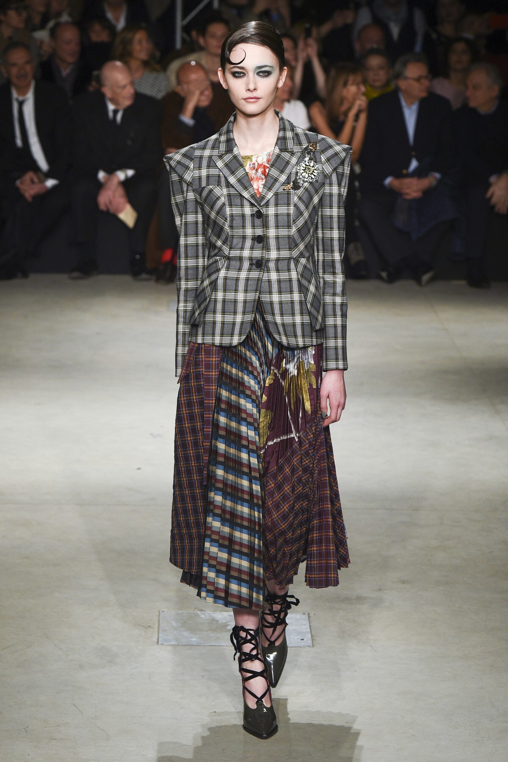 checked blazer with pleated skirt