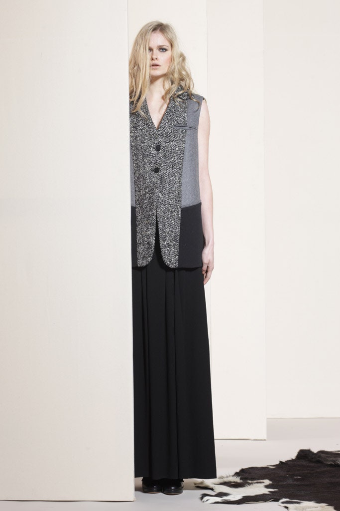 black gray fitted vest and relaxed pants