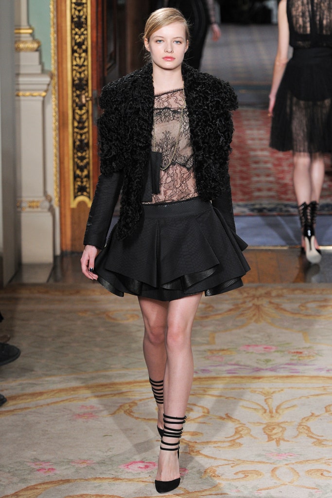 black faux-fur oversized ruffled coat