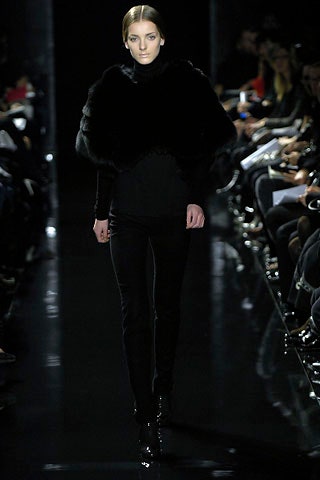black fitted top with fur cape