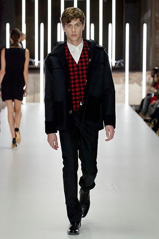 black wool jacket with red vest