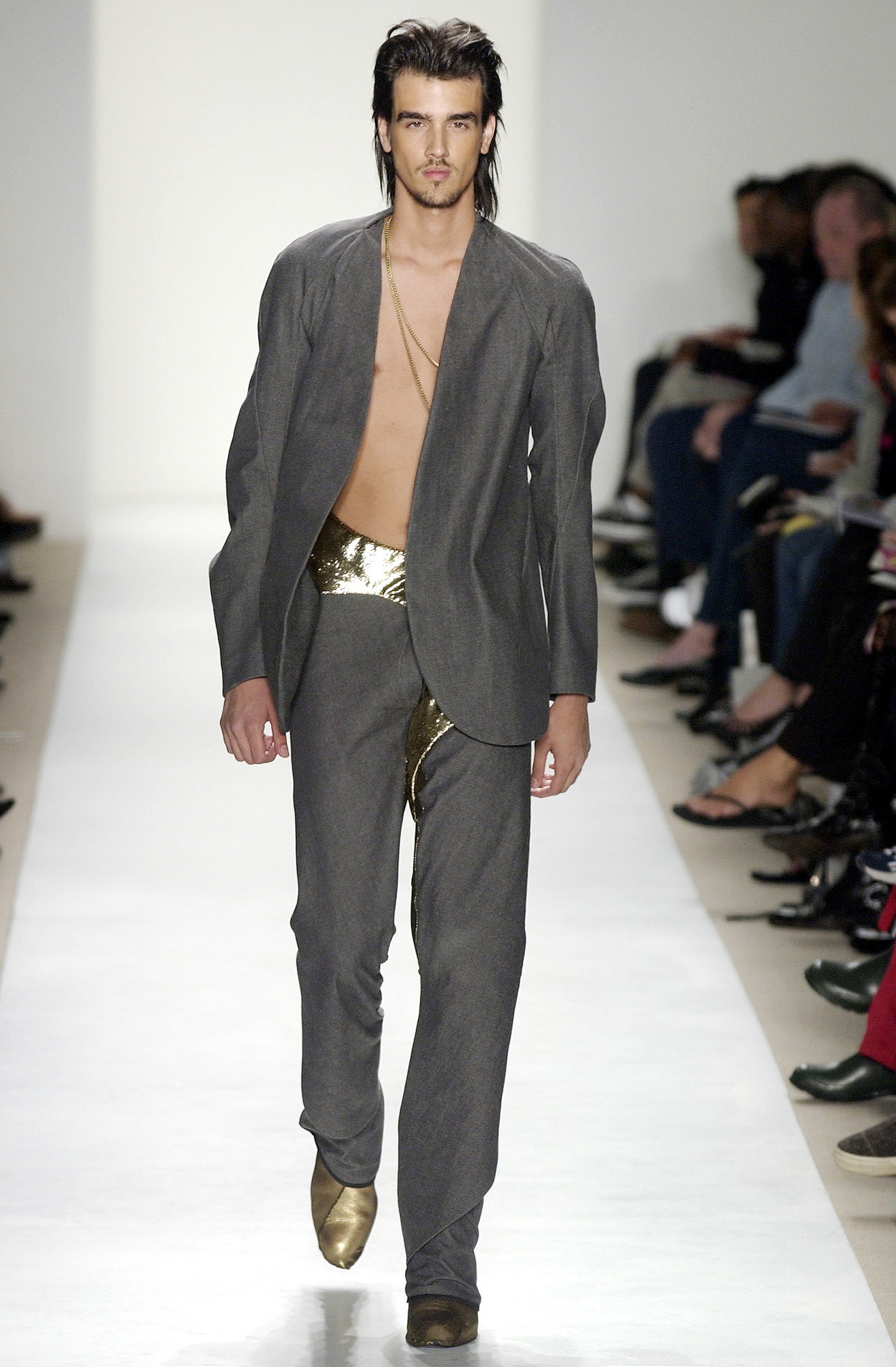 tailored gray suit with gold shoes