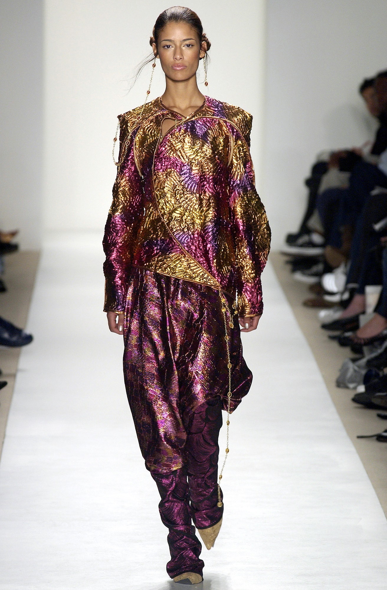 purple and gold embroidered top with relaxed pants