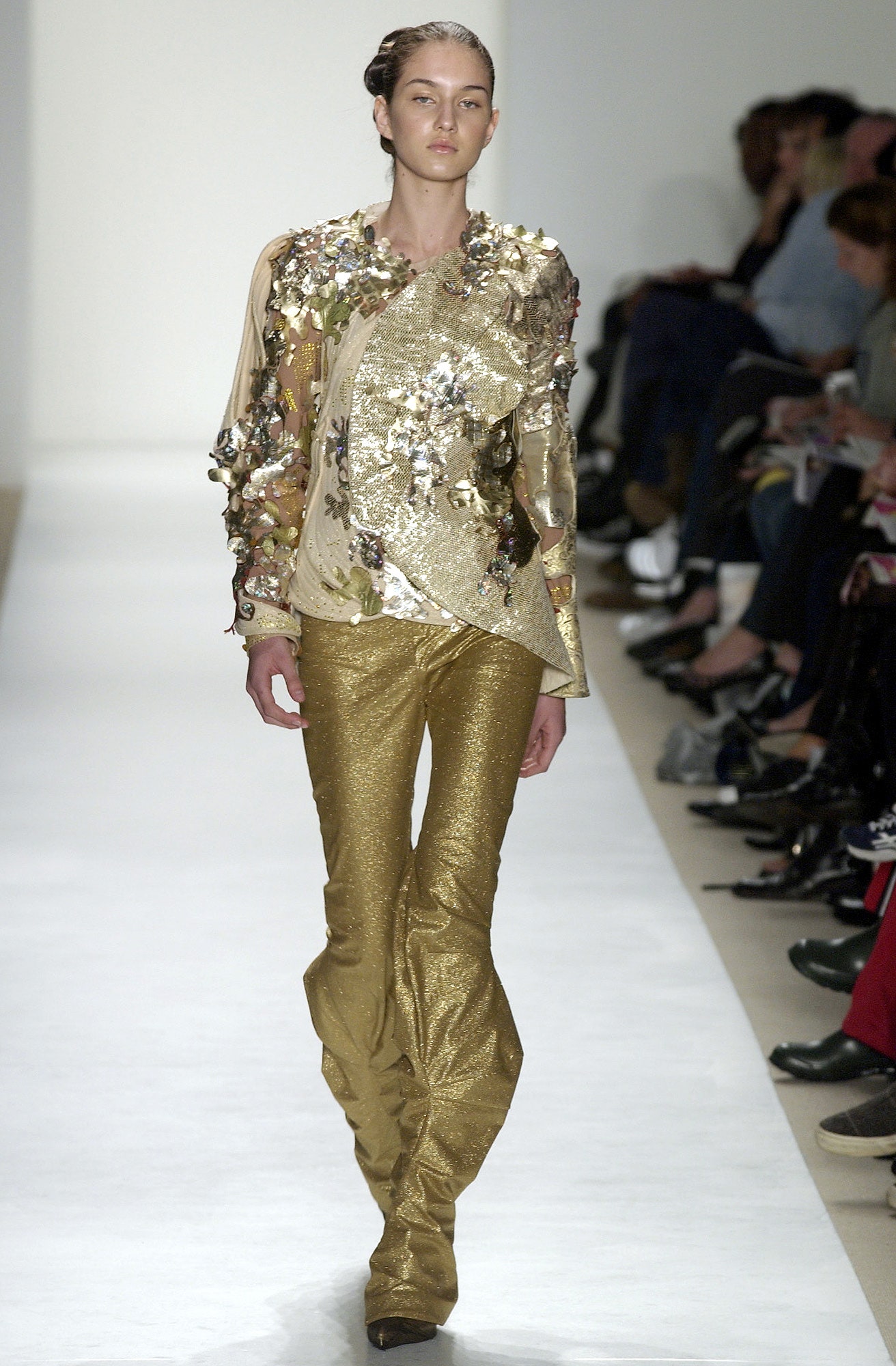 gold embroidered top with flared pants