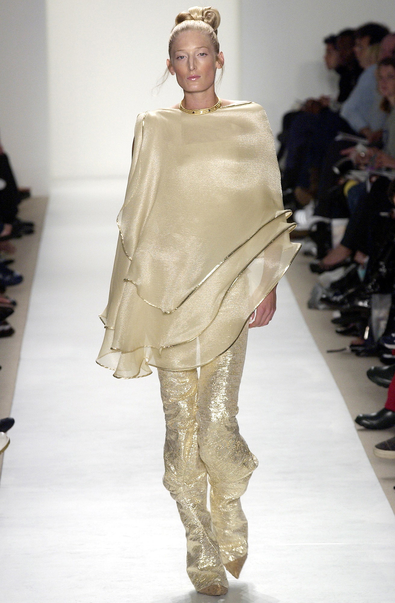 gold silk draped top and flared pants