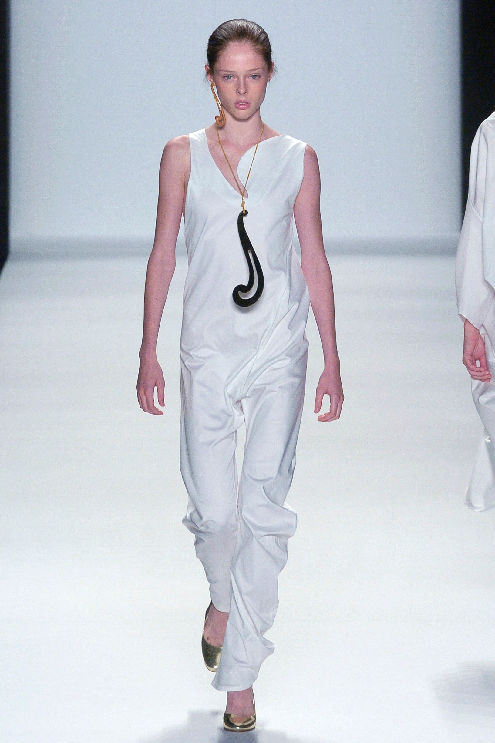 white relaxed sleeveless jumpsuit