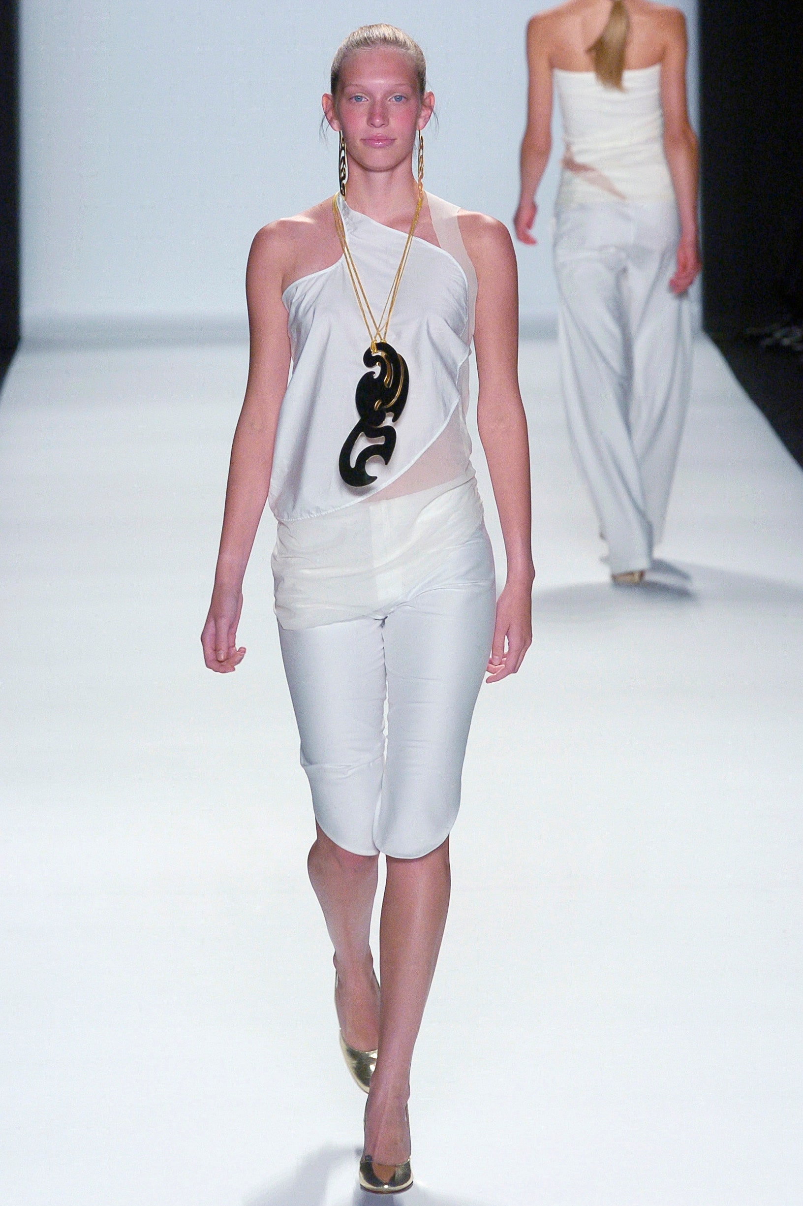 white silk fitted top and pants