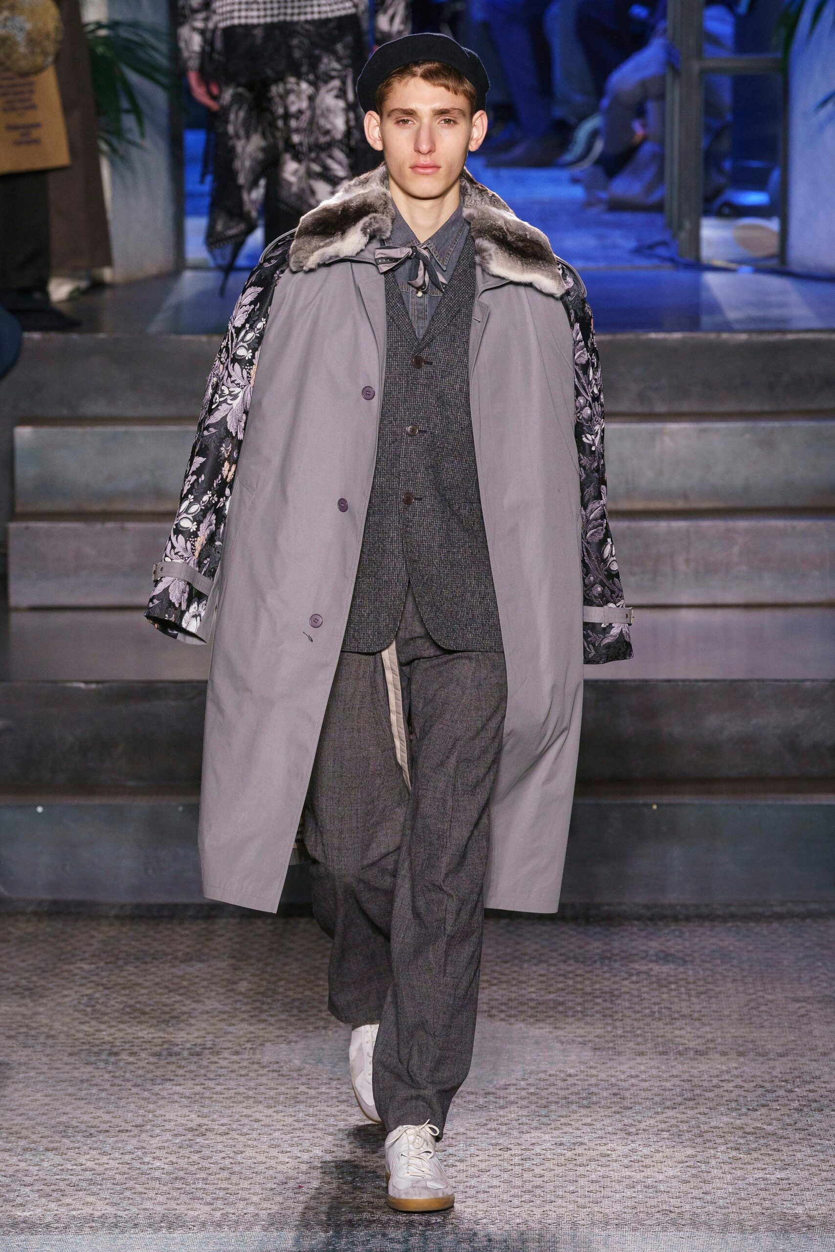 gray faux-fur coat and tailored suit