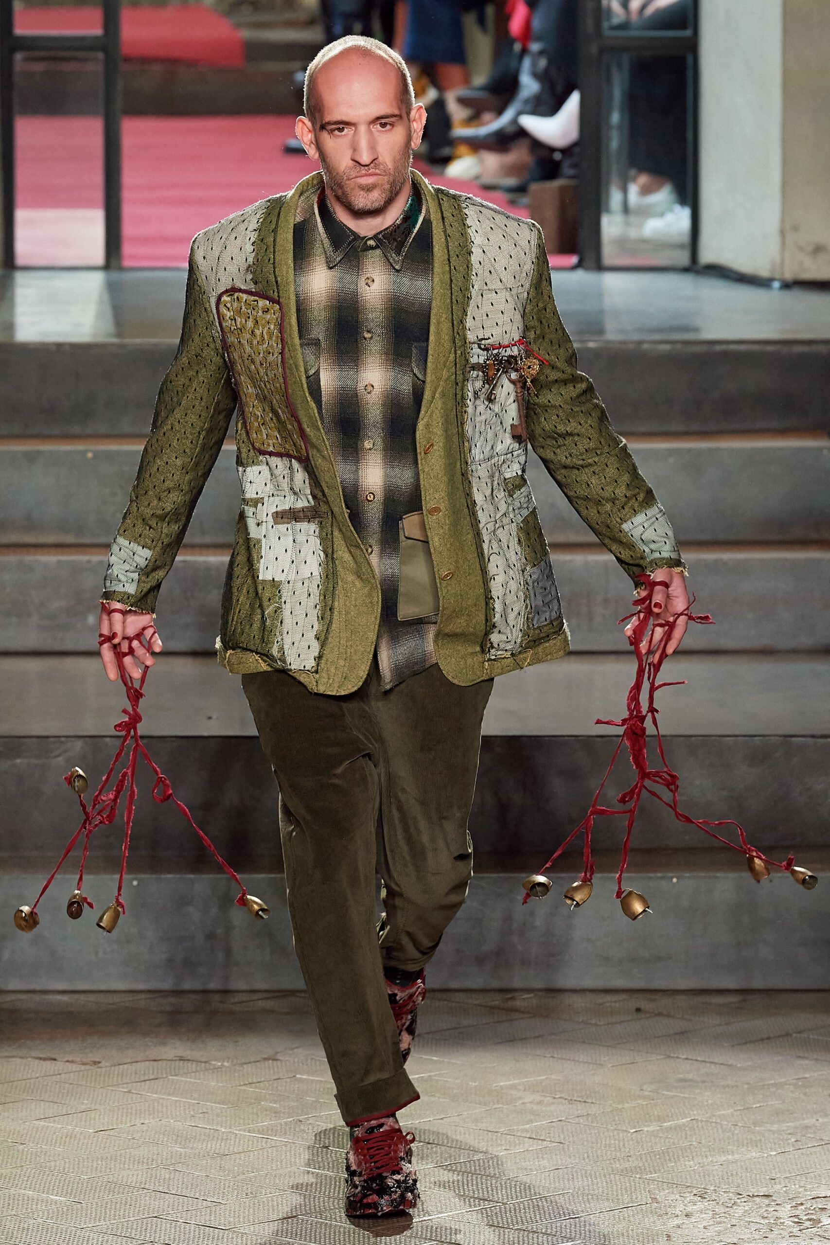 green structured blazer with checked shirt