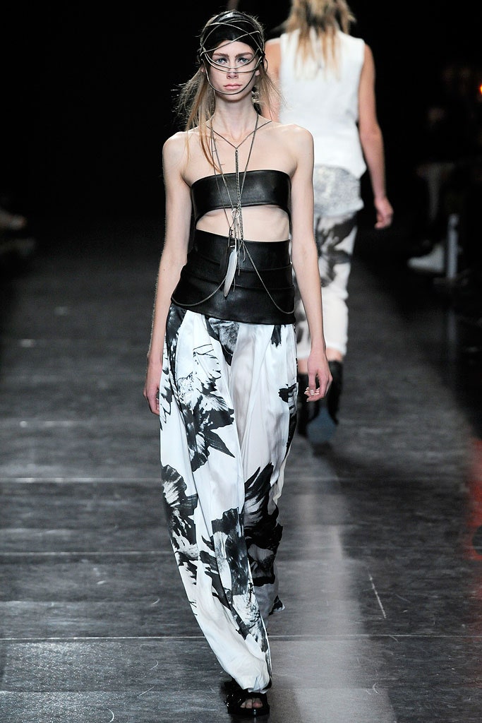 black silk strapless top with flared pants
