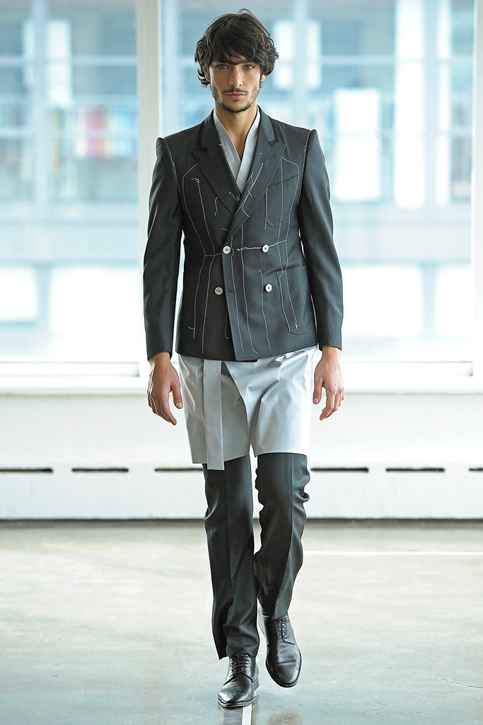 black tailored suit with white shirt