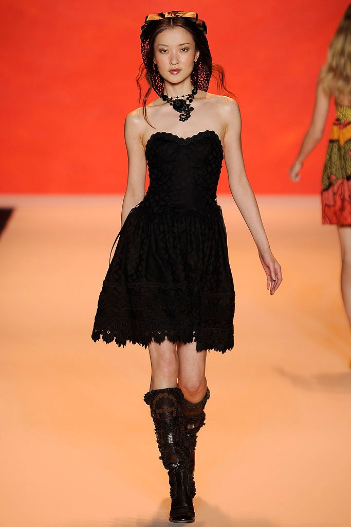 black strapless mini dress with boots