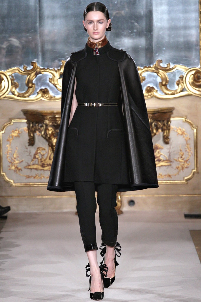 black leather cape and jumpsuit