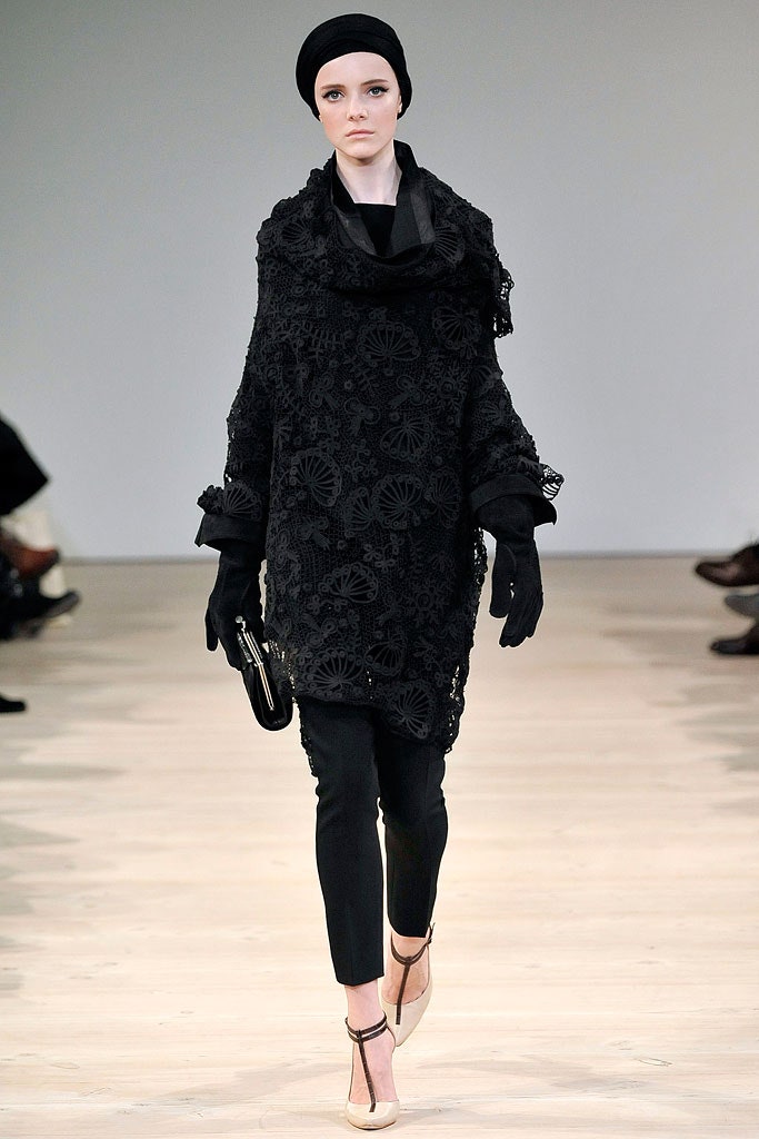 black lace top with slim pants