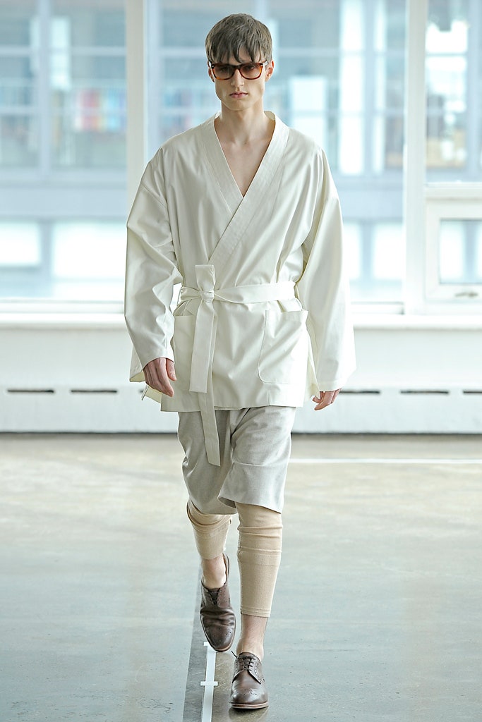 white relaxed jacket with beige pants