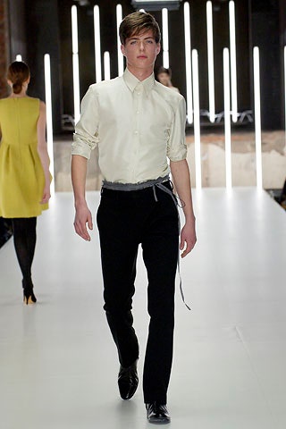 fitted white shirt and black pants