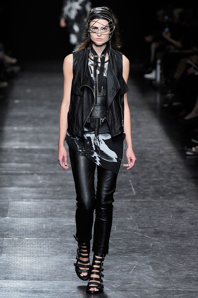 black leather fitted vest and pants